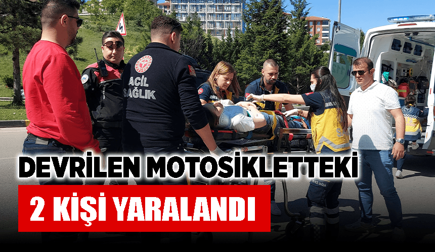 Devrilen motosikletteki 2 kişi yaralandı