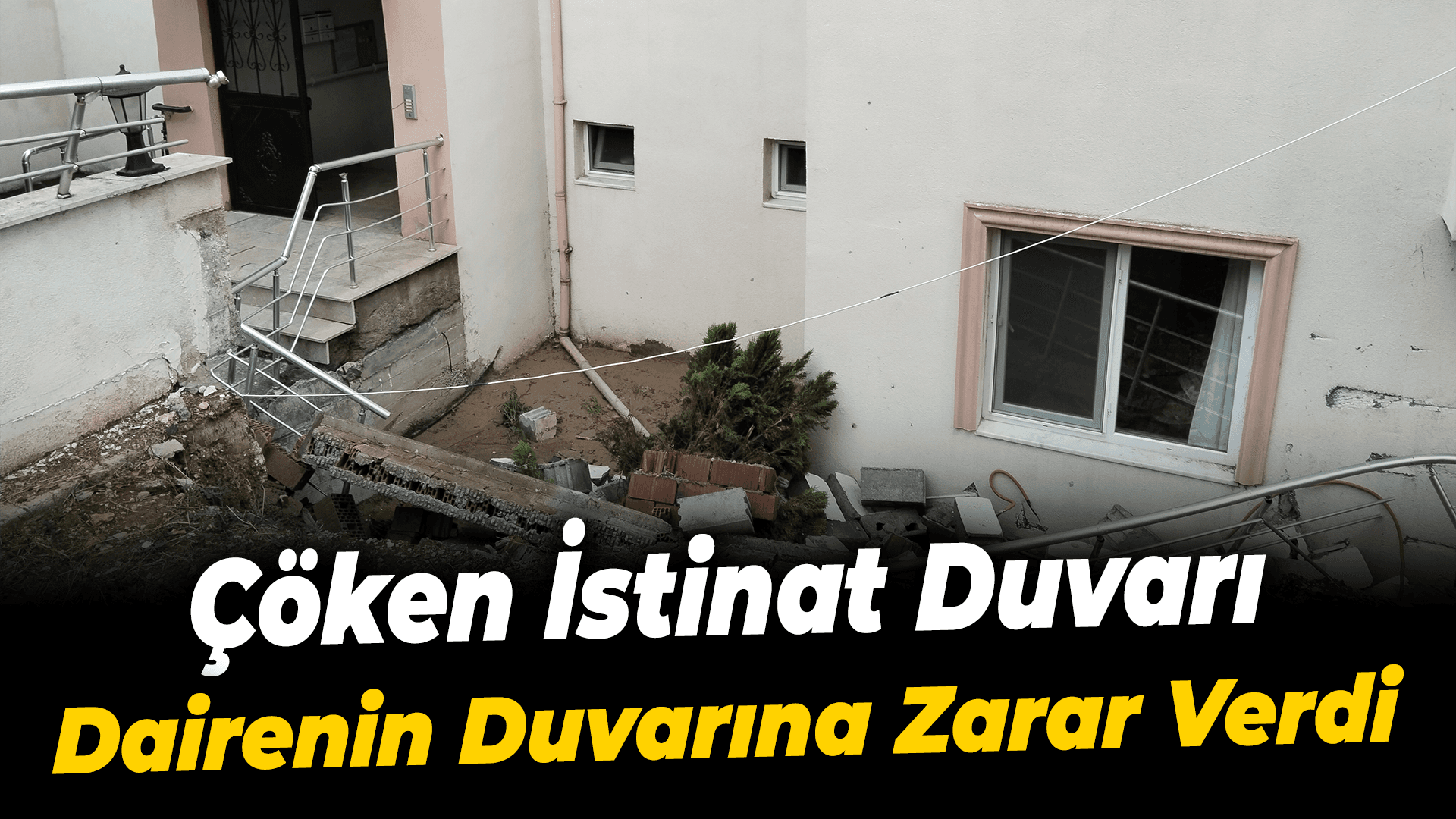 Karabük'te çöken istinat duvarı bir dairenin balkonuna zarar verdi