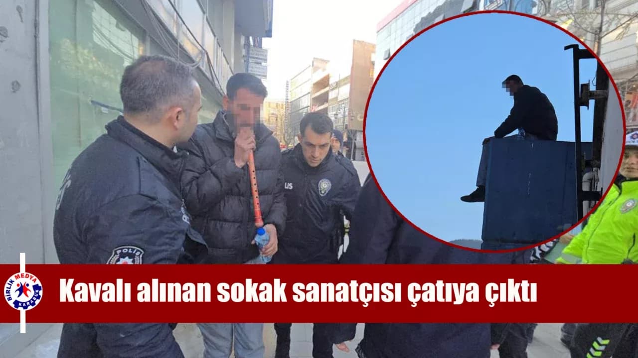 Kavalı alınan sokak sanatçısı çatıya çıktı